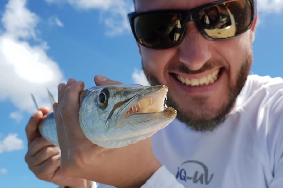 Apprentissage de la pêche malgré une météo difficile